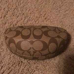 Coach sunglasses case.